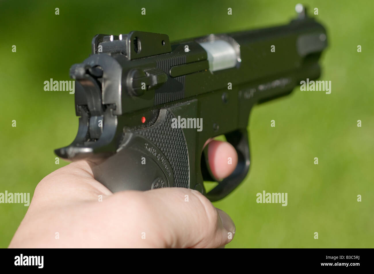 Aiming gun Stock Photo