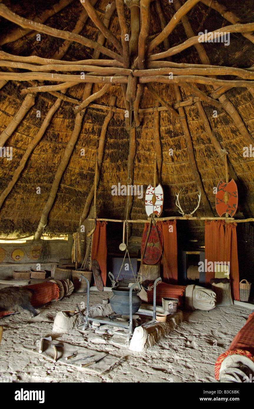UK, Wales, Pembrokeshire. Interior of the re-created Chieftain's Hut, an Iron Age Celtic Roundhouse Stock Photo