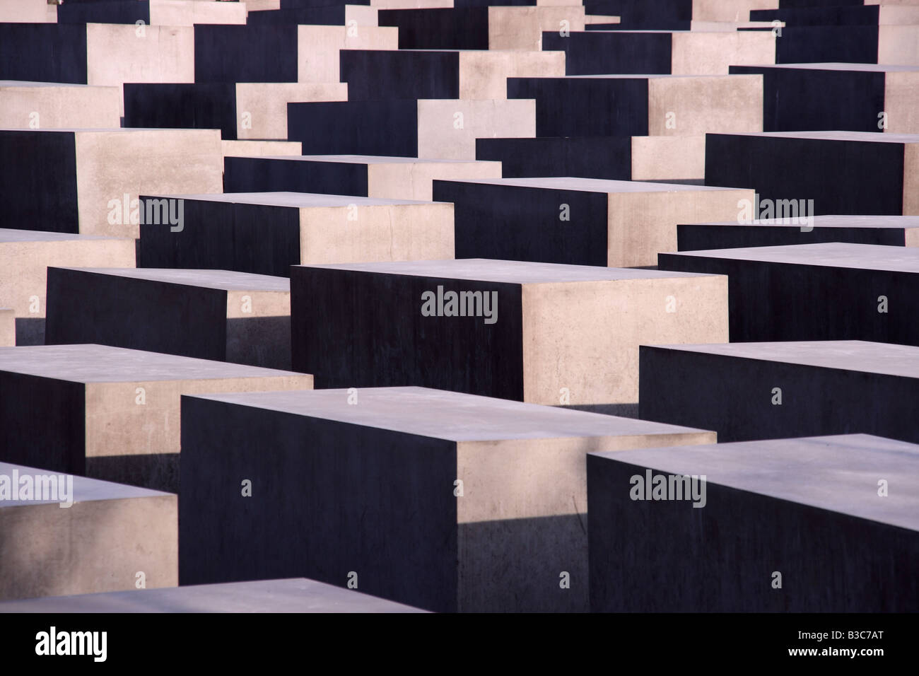 Germany, Berlin. The Memorial to the Murdered Jews of Europe, also known as the Holocaust Memorial, is a memorial in Berlin to the Jewish victims of the Holocaust, designed by architect Peter Eisenman and engineers Buro Happold. Stock Photo