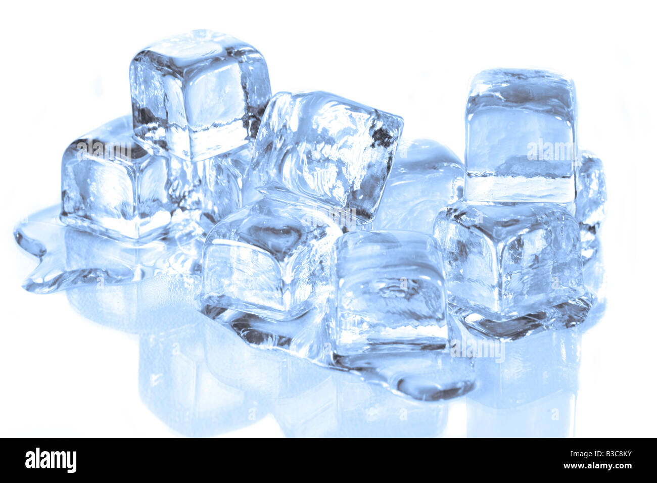 Ice Cubes Melting on a Reflective Surface Stock Photo