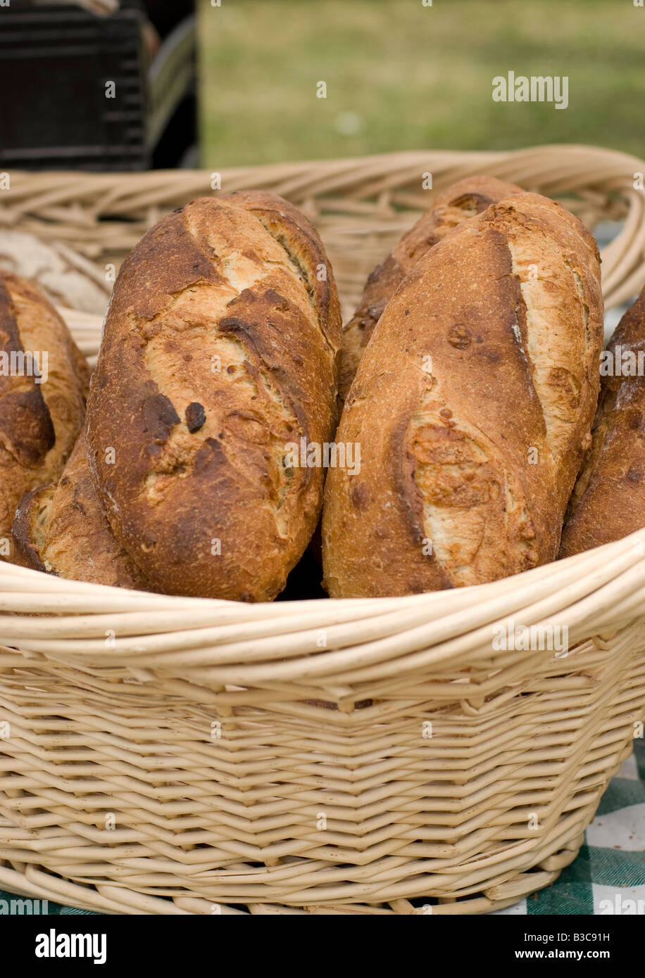 Individual loaves of bread for sale at a farmers market Stock Photo
