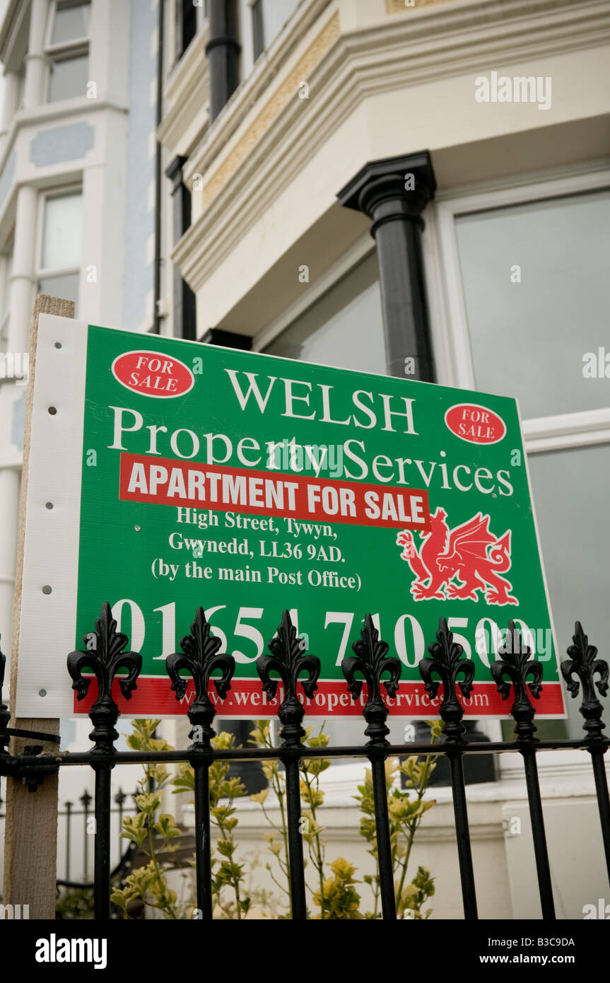 WELSH PROPERTY SERVICES estate agents sign advertising apartment for sale Aberdyfi Wales UK Stock Photo