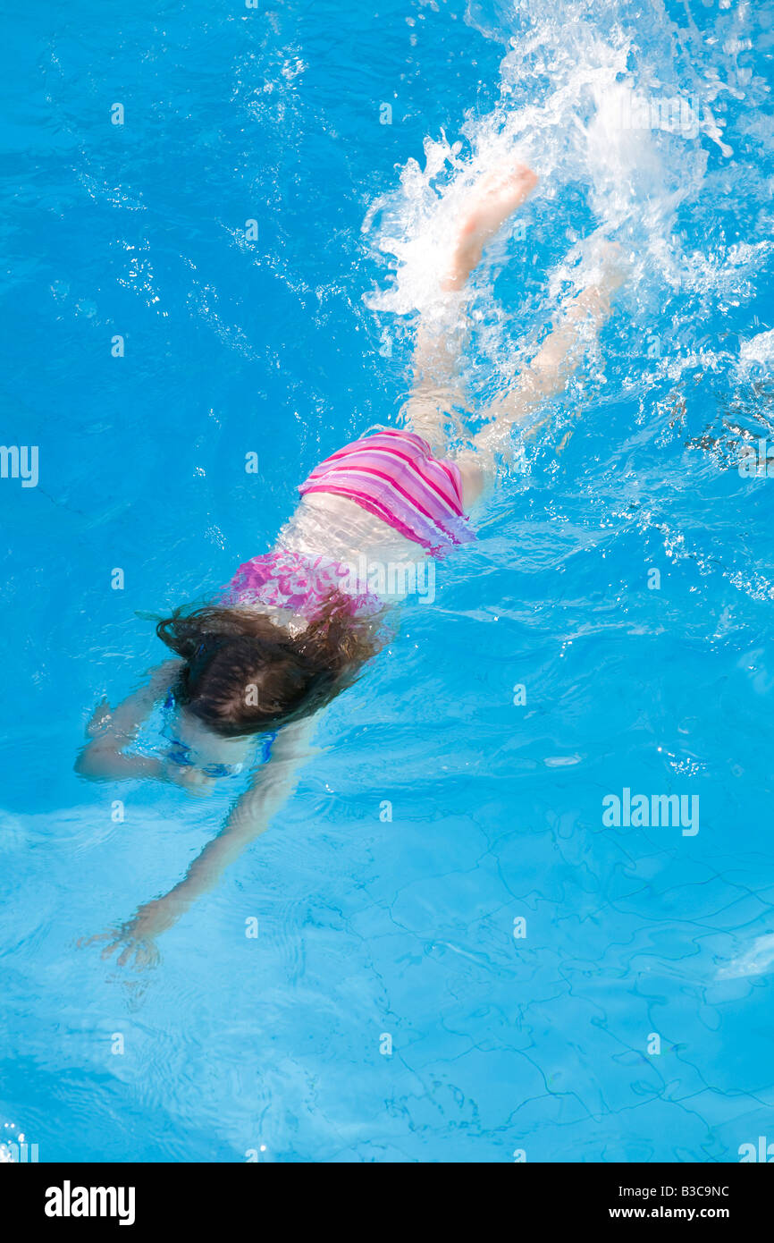 Young Girl Swimming Stock Photo - Alamy