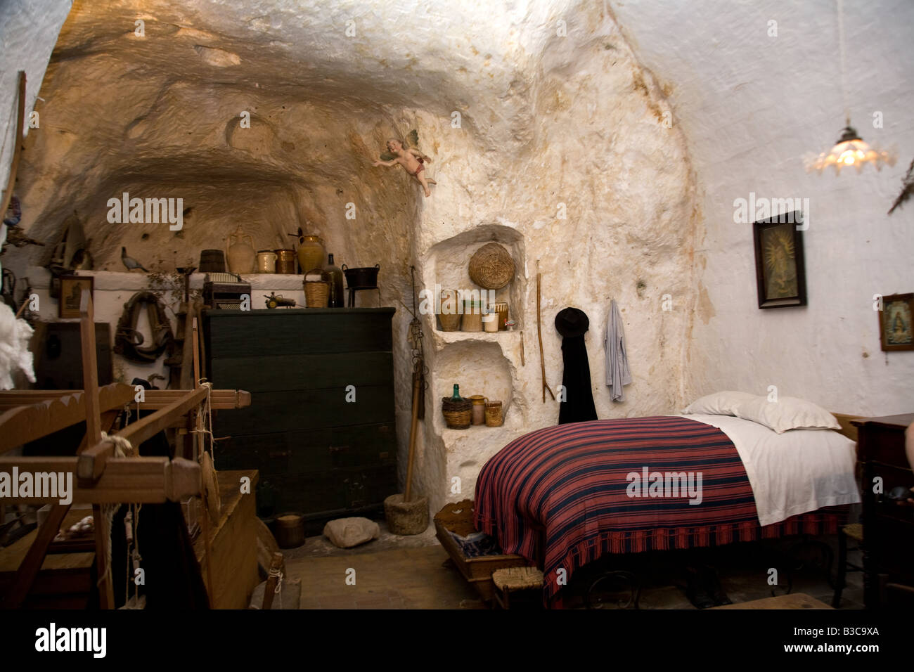 Interior of restored cave dwelling in Sassi Matera Southern Italy June 2008 Stock Photo