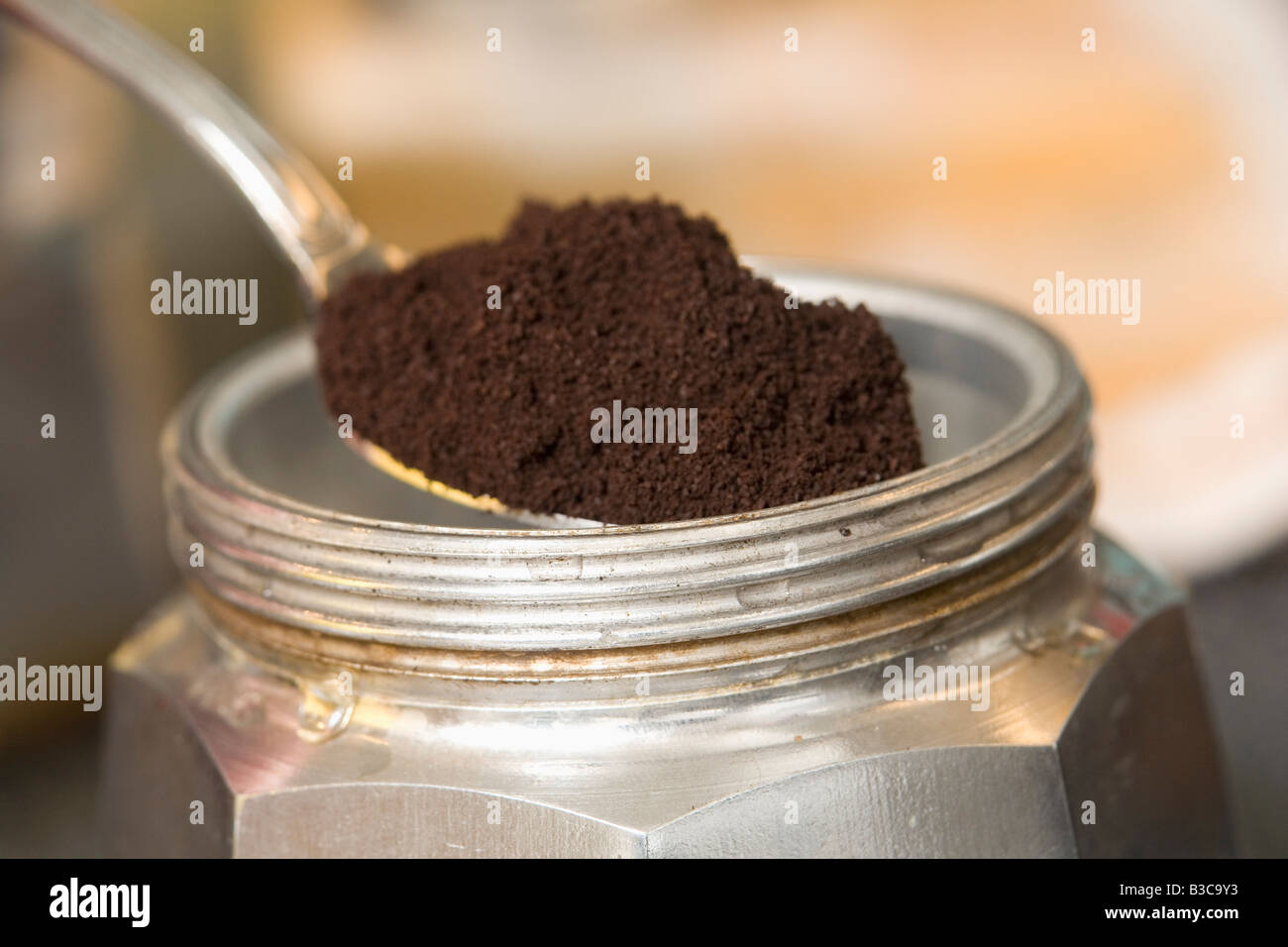 Espresso coffee being made in a stovetop moka pot Stock Photo Alamy