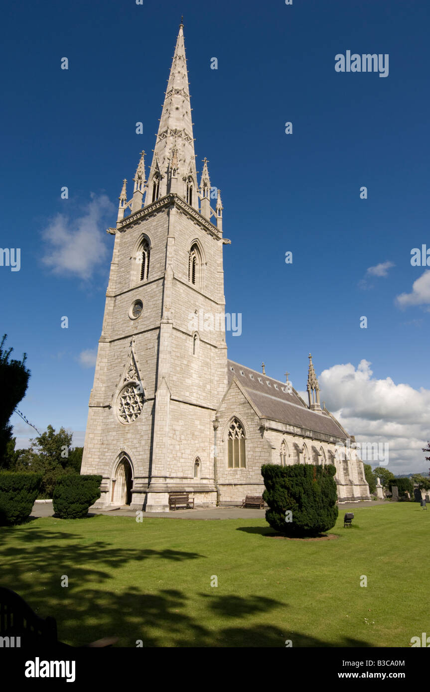 The Victorian marble church Bodelwyddan North Wales UK, with imposing spire, blue sky summer afternoon Stock Photo