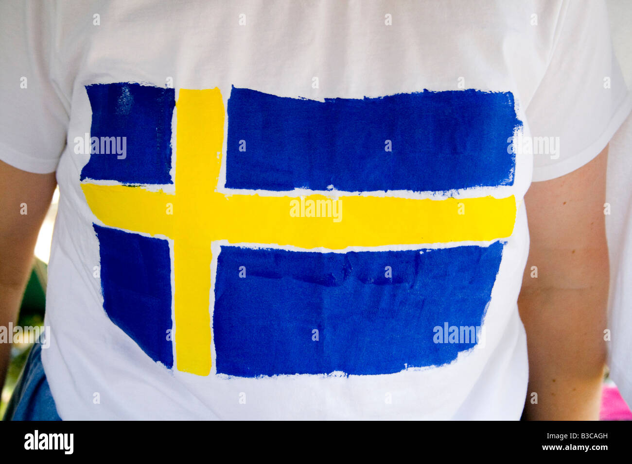 Hand painted flag of Sweden on tshirt. Svenskarnas Dag Swedish