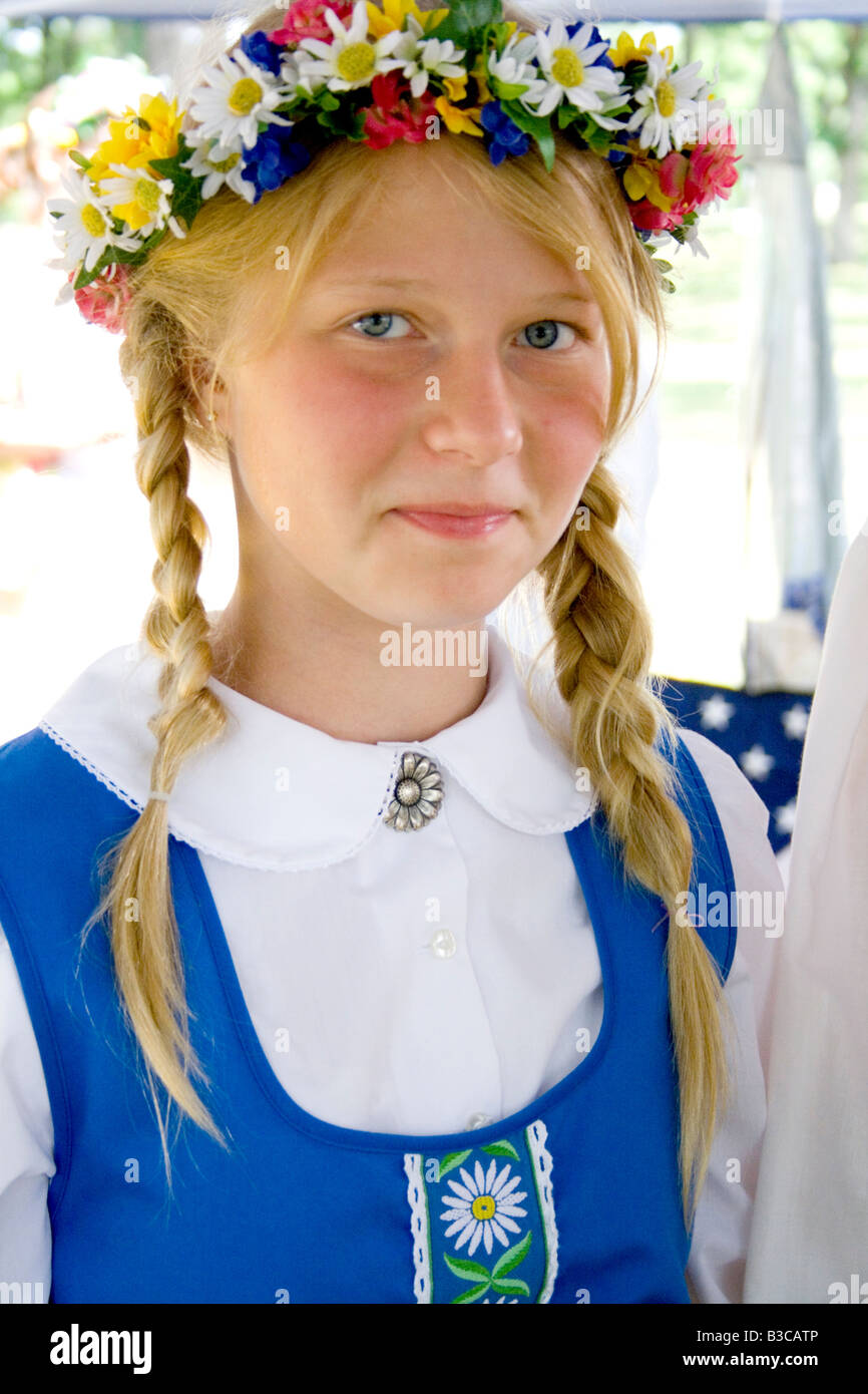 Teenager wearing garland and costume of Sweden. Svenskarnas Dag Swedish Heritage Day Minnehaha Park Minneapolis Minnesota USA Stock Photo