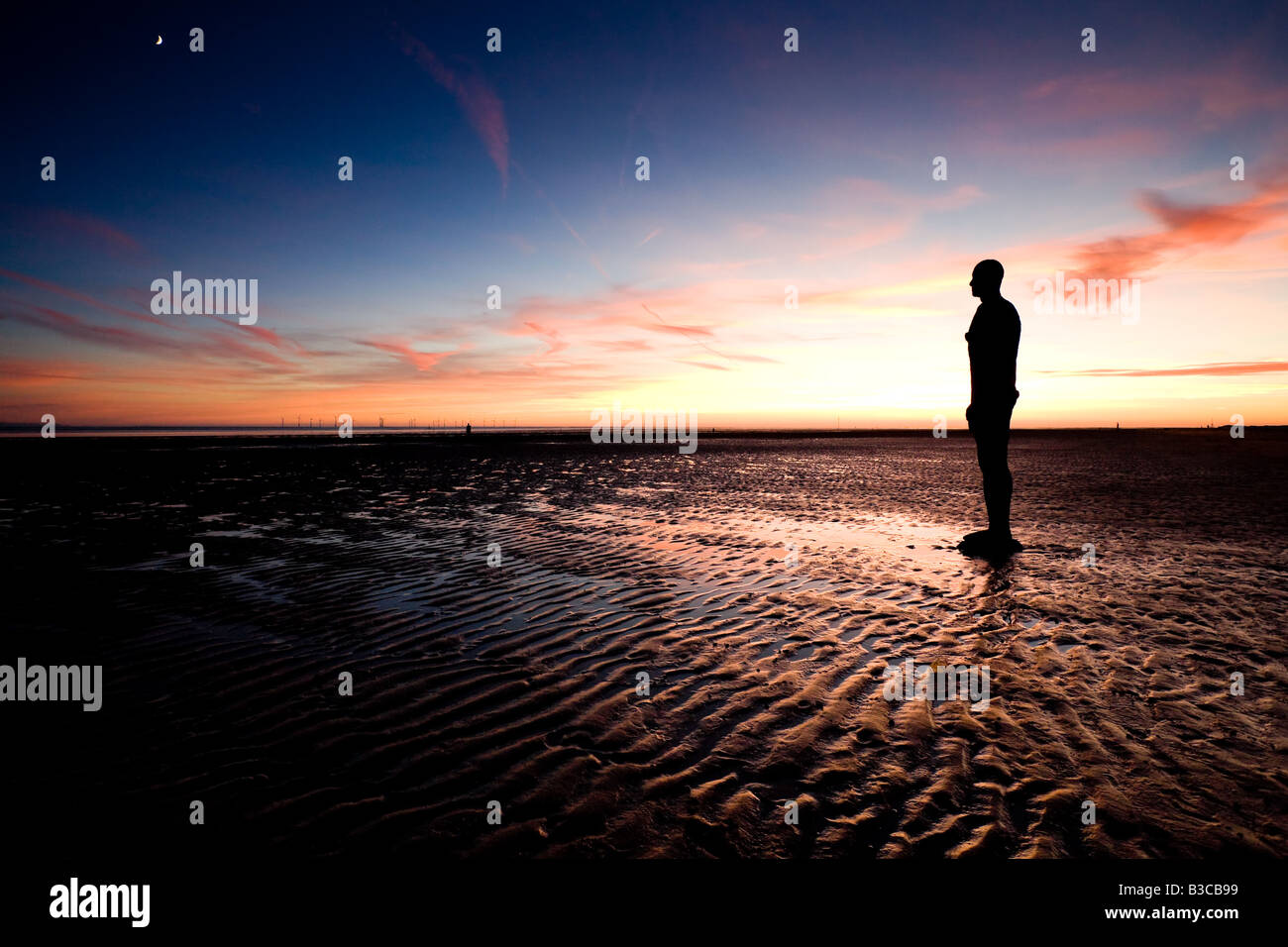 Anthony Gormley Iron Men Statues on Crosby Beach, Liverpool, UK Stock