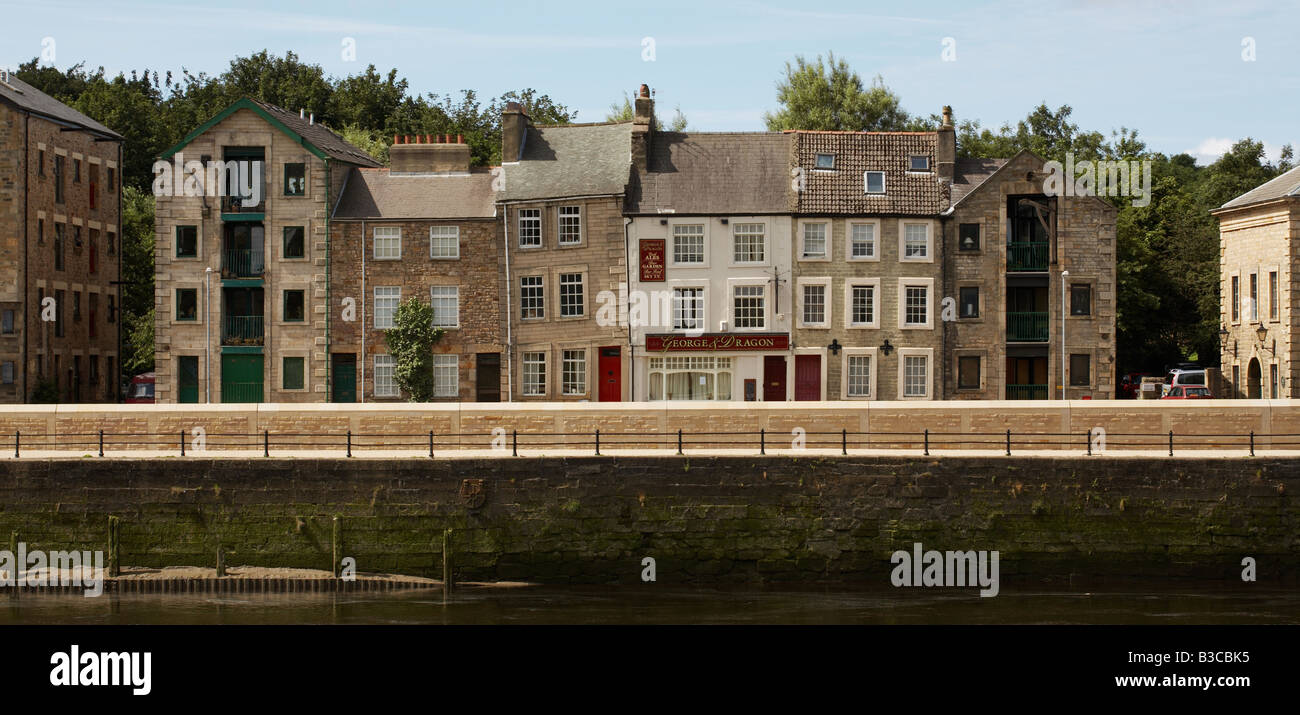 old wharf buildings at St Quay alongside the River Lune in