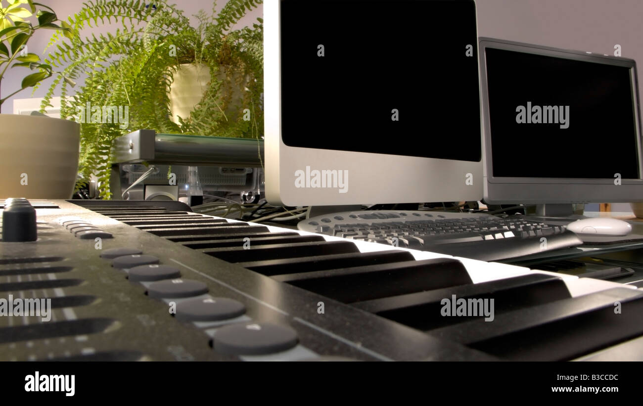 a computer music workstation and keyboard Stock Photo Alamy
