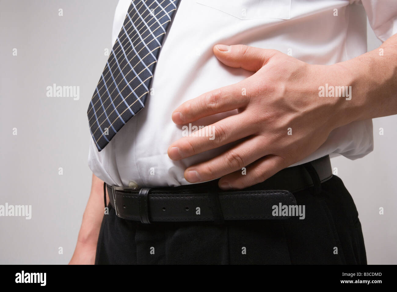 Waist of fat businessman Stock Photo