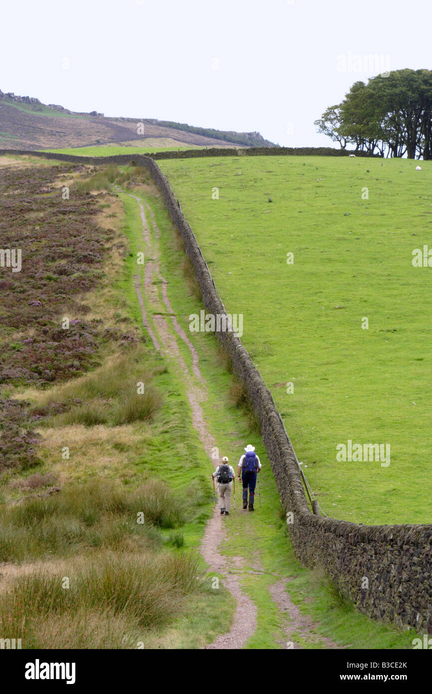 two walkers near lower roach end in the peak district Stock Photo