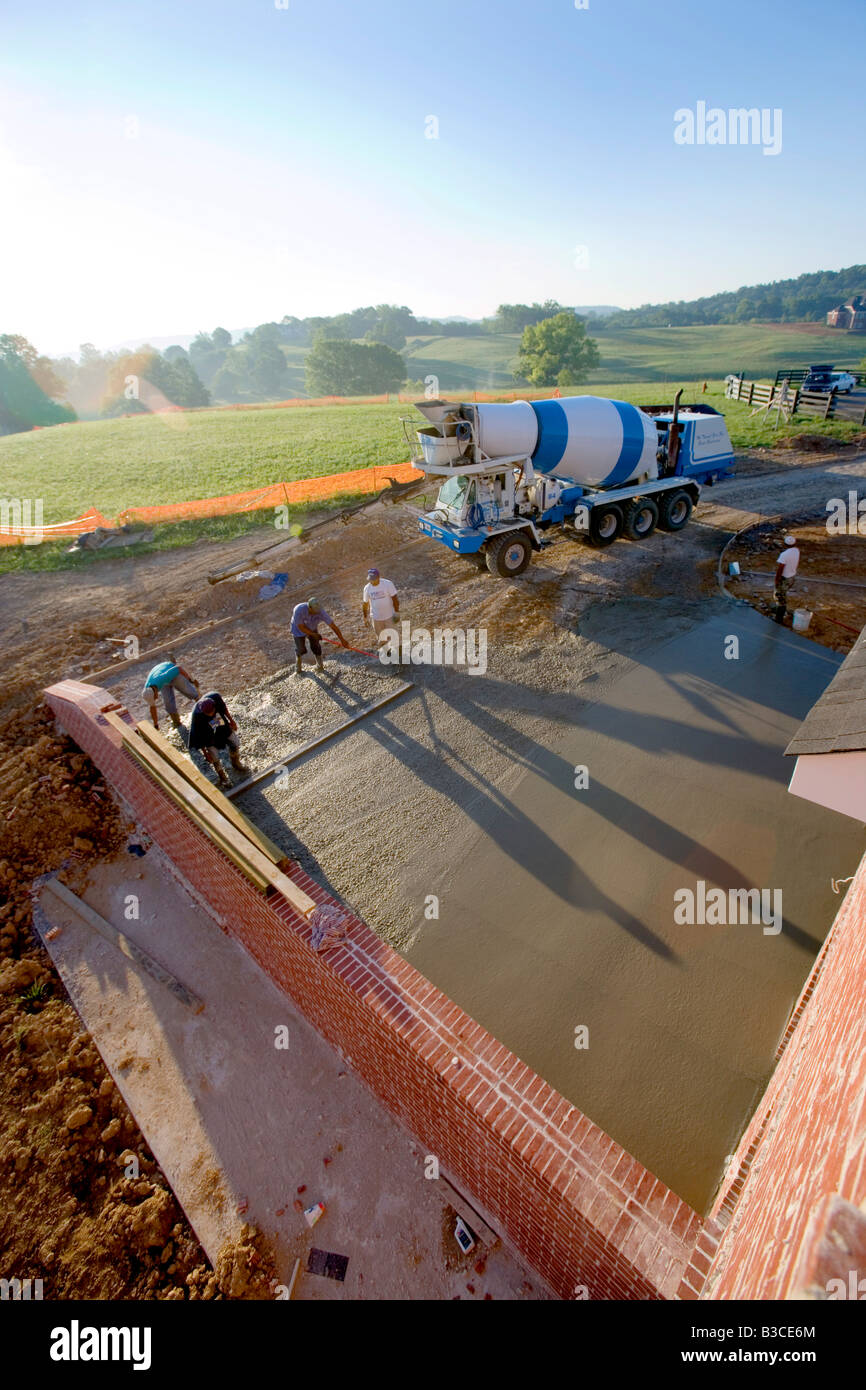 Pouring concrete driveway at a construction site for a private home, Franklin, Tennessee Stock Photo