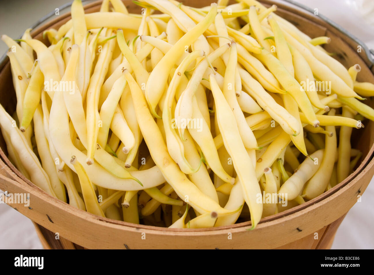 Bushel full of yellow snap beans Stock Photo Alamy