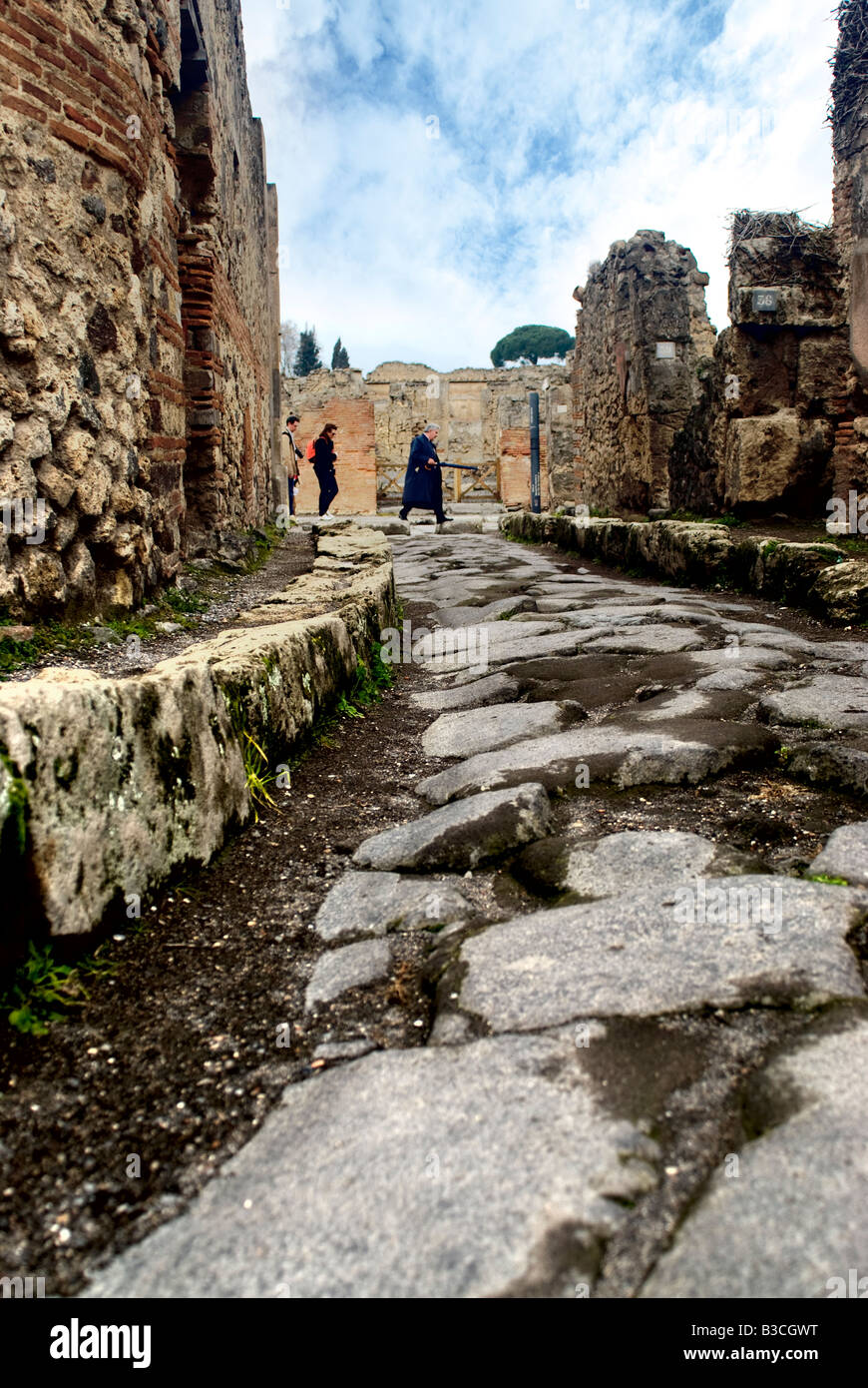 Ancient Paved Road With Carriage Wheel Ruts. Pompeii Italy Stock Photo