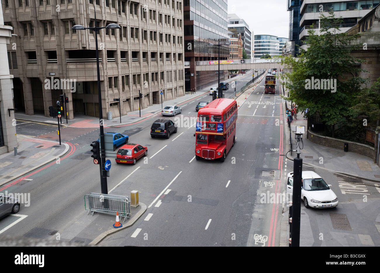 Heritage red Routemaster London Bus in Lower Thames Street City of London GB UK Stock Photo