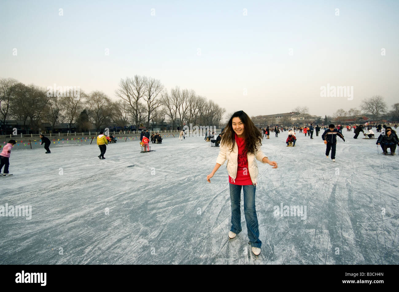 China, Beijing, Houhai area. A Chinese girl ice skating (MR Stock Photo