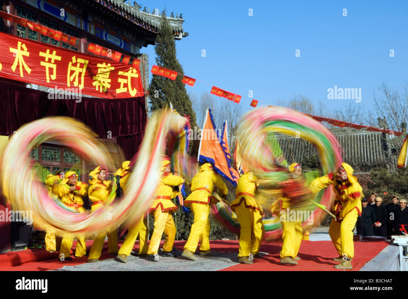 China, Beijing. Beiputuo temple and film studio. Chinese New Year Spring Festival - Dragon Dance performers. Stock Photo