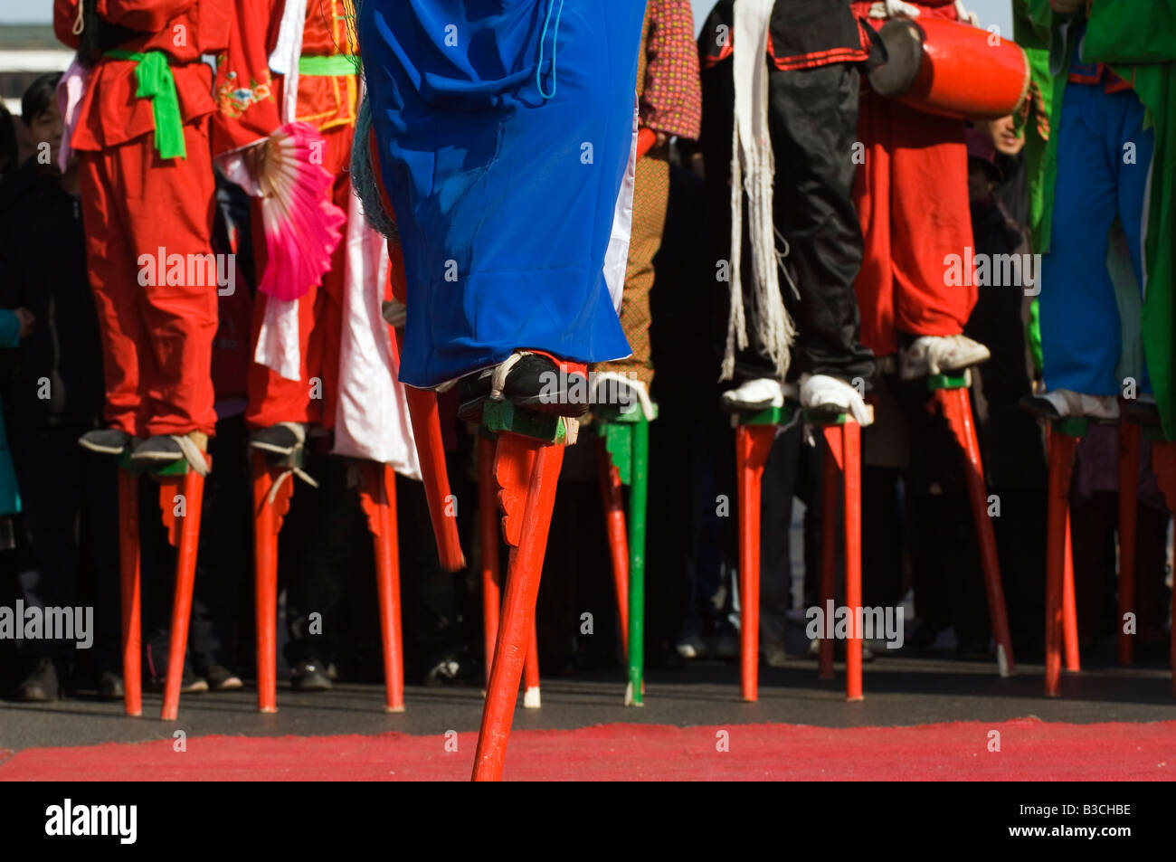 China, Beijing. Changdian street fair - Chinese New Year Spring Festival - stilt walking performers. Stock Photo