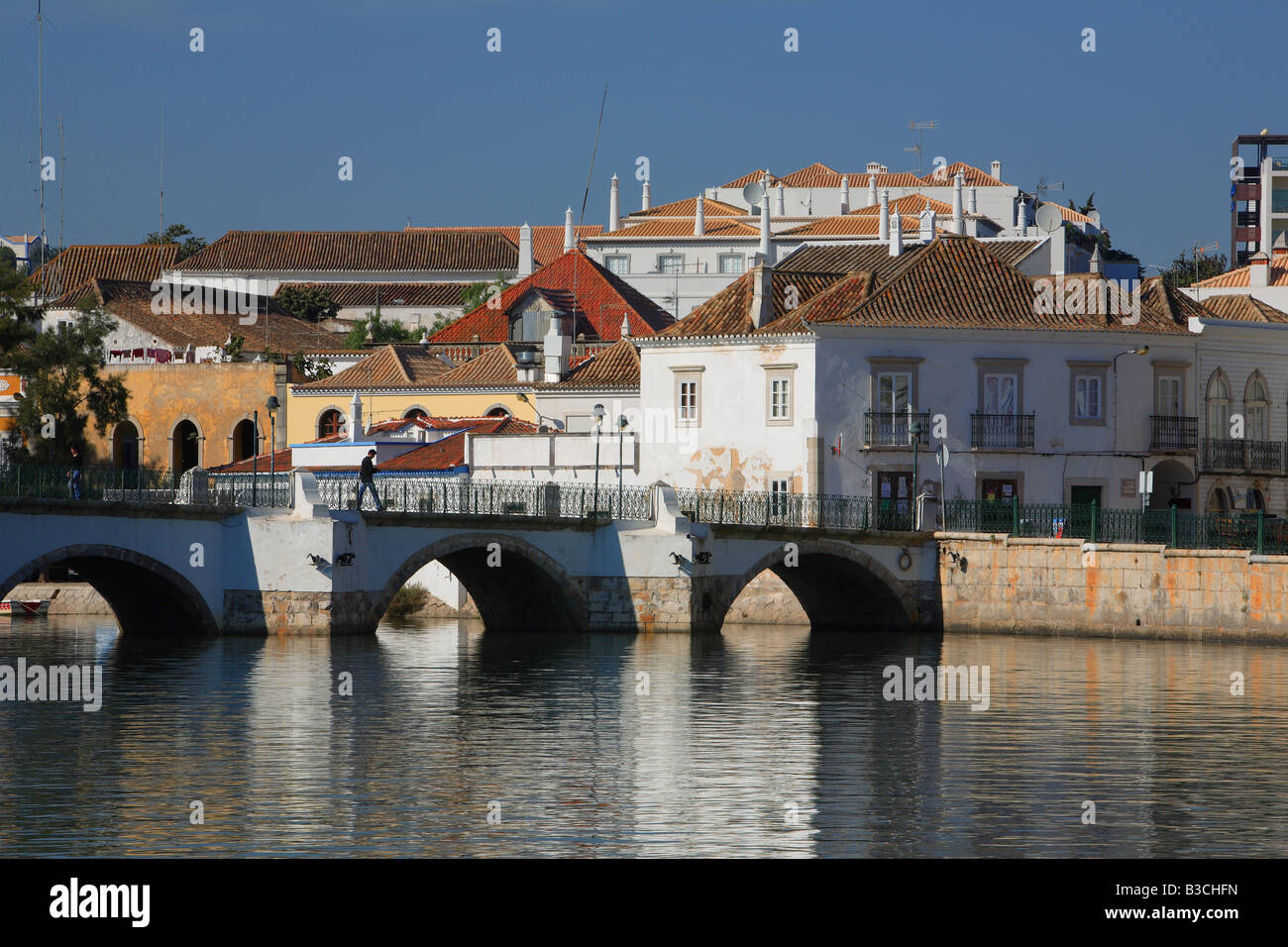 old city and roman bridge crossing river Gilao Tavira Algarve Portugal Stock Photo