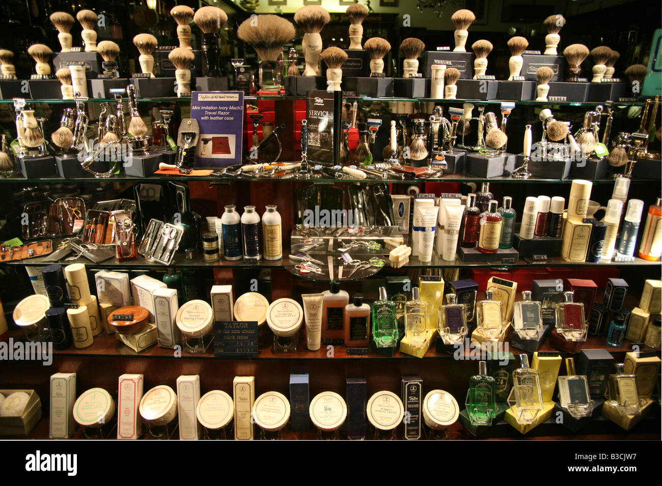Brushes and other shaving equipment in luxury shop window, London Stock