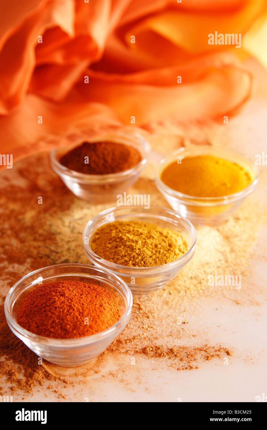 Different spices in bowls Stock Photo