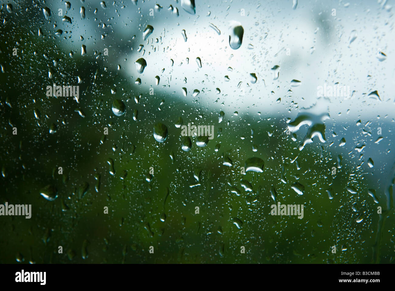 Rainy weather, landscape through the window of a car Stock Photo - Alamy
