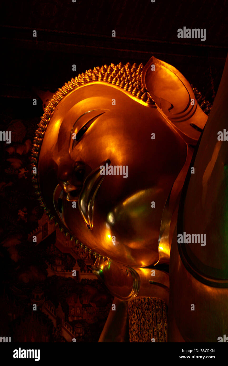 Reclining Buddha image at Wat Pho in Bangkok Thailand COPYRIGHT Arthur Jones Dionio Stock Photo
