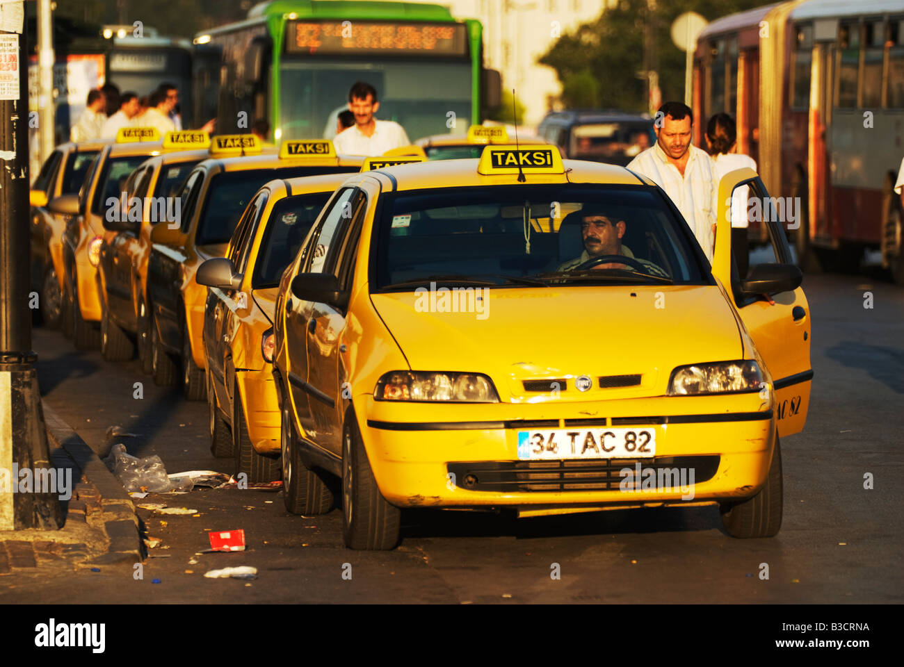 Taxis line up waiting for customers near Galata Bridge, Istanbul, Turkey Stock Photo