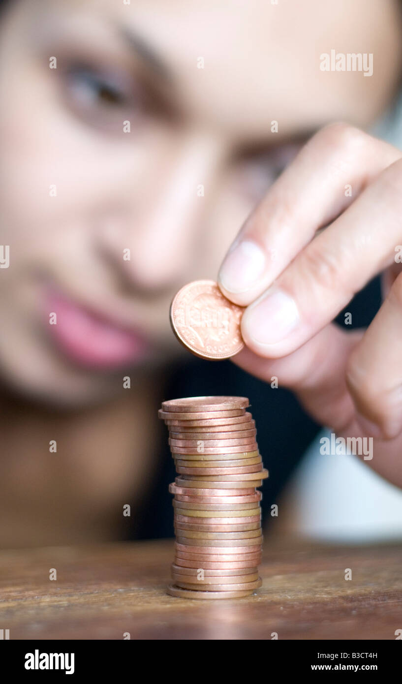 recession, debt -  counting the pennys Stock Photo