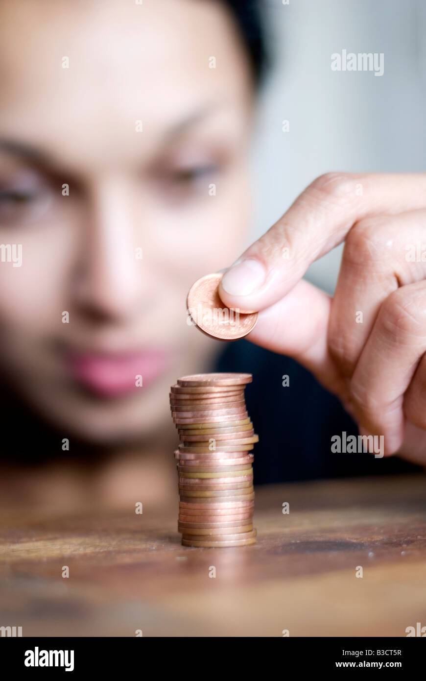 Counting the pennys - recession Stock Photo
