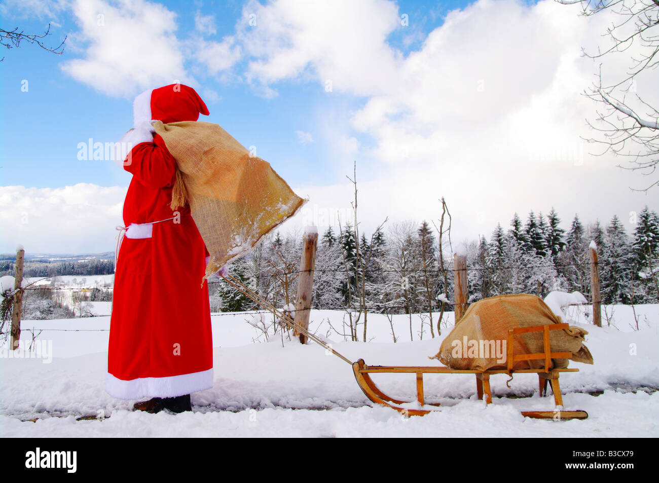 Santa Claus Father Christmas in a beautiful winter landscape Stock Photo Alamy