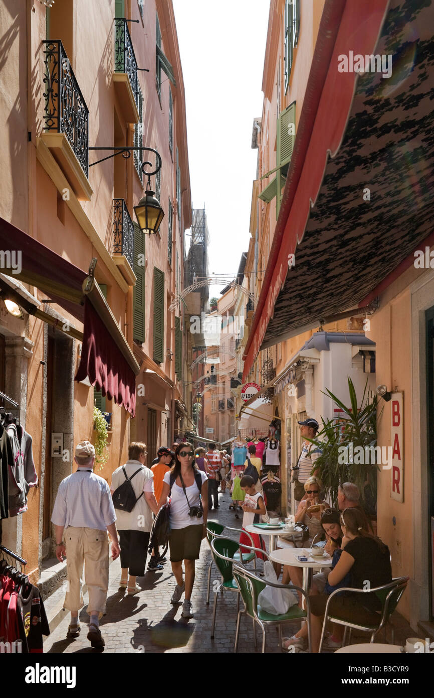 Shops and cafe on a typical street in the old town (Monaco Ville), Monaco, French Riviera, Cote d'Azur, France Stock Photo