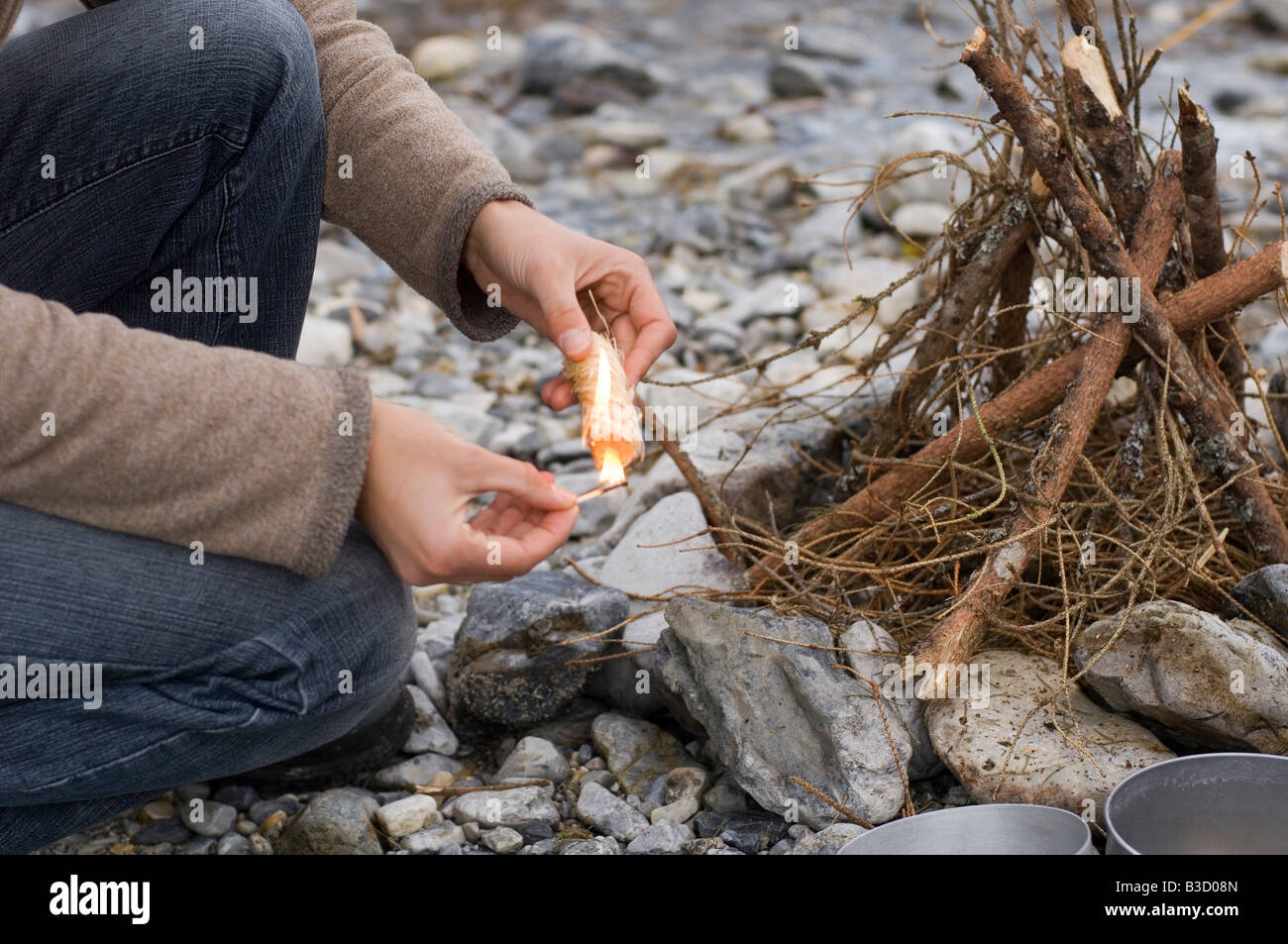 Austria, Salzburg County, Person setting up a fire Stock Photo