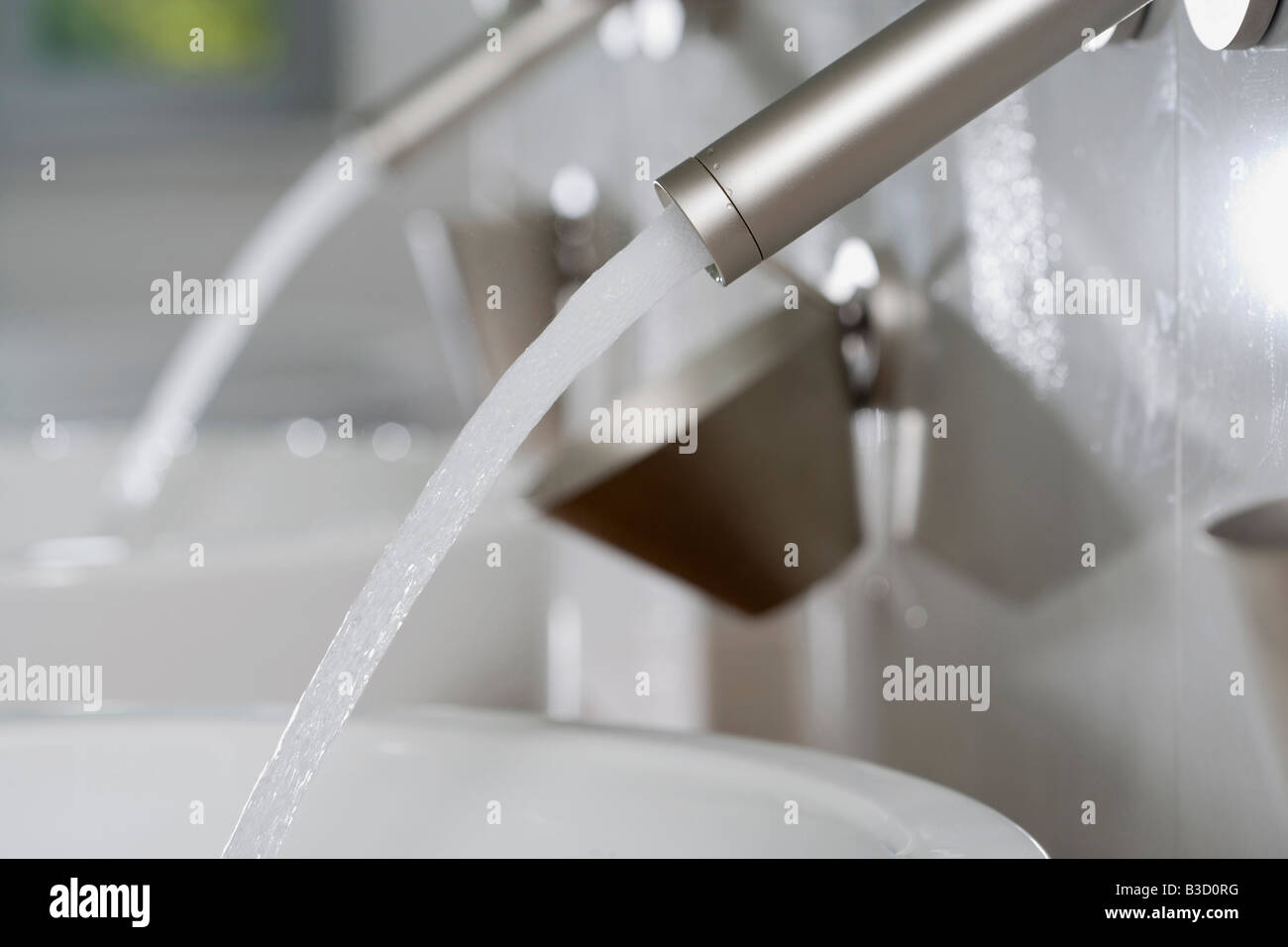 Close up of water faucet, running water Stock Photo Alamy