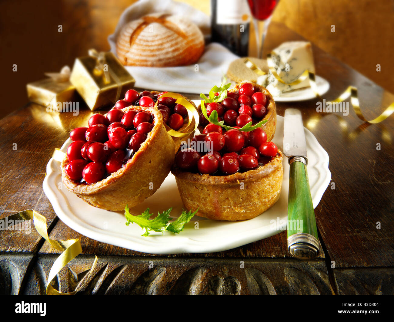 Cranberry topped pork pie - traditional British winter christmas food Stock Photo
