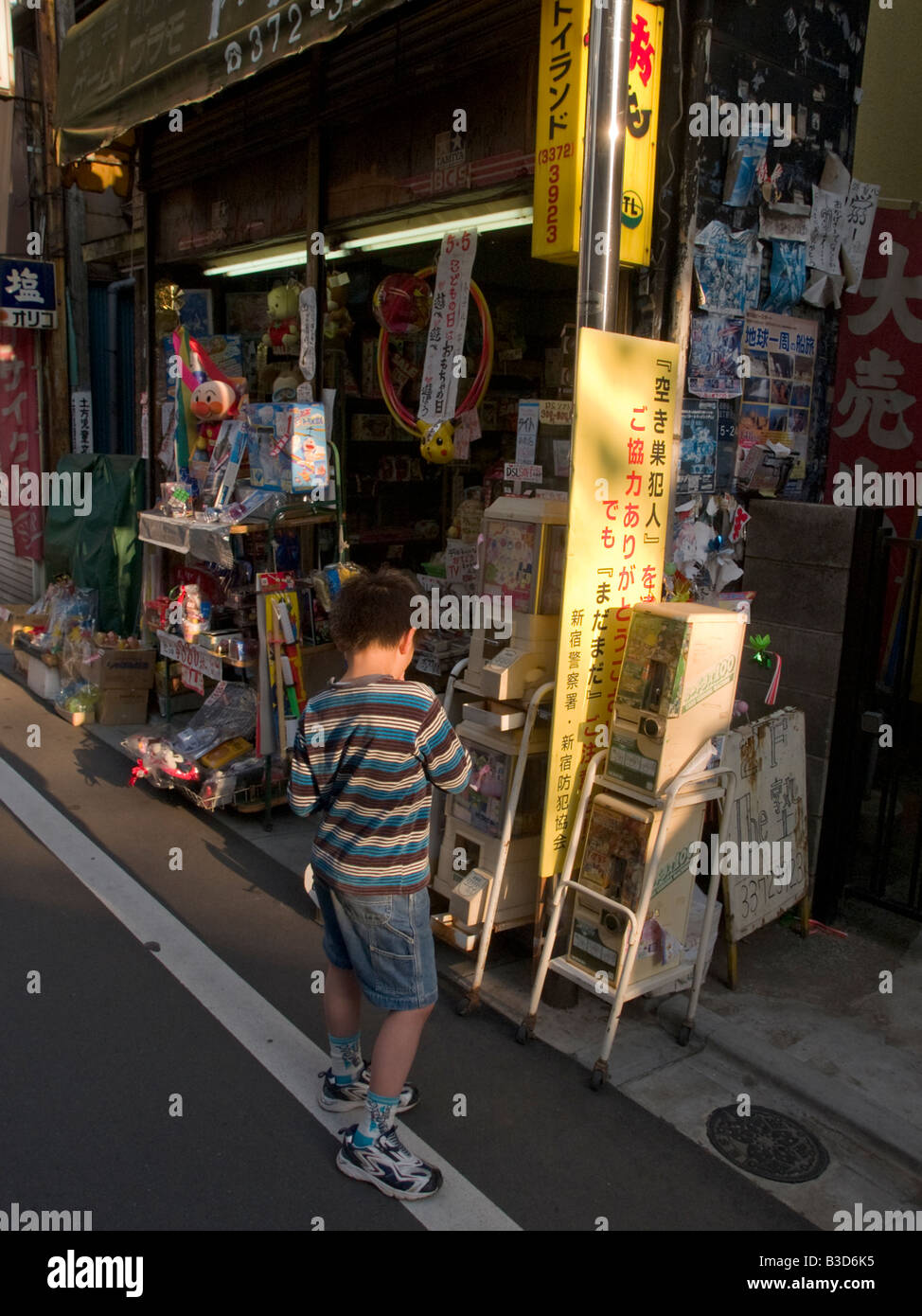 Boy In Front Of A Toy Store Tokyo Japan Stock Photo Alamy