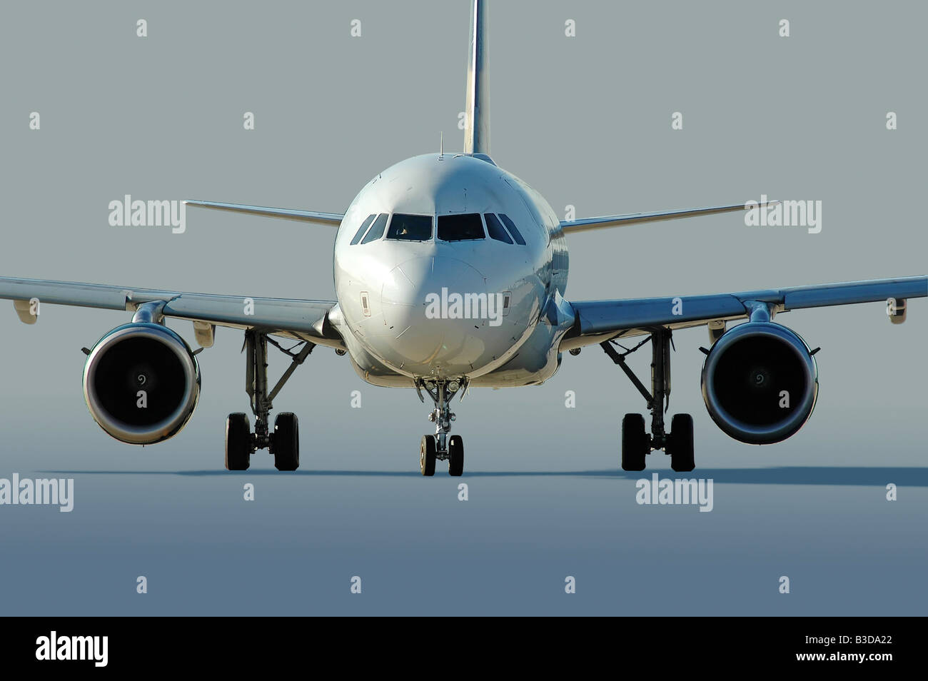 Commercial airliner taxiing at the airport Stock Photo