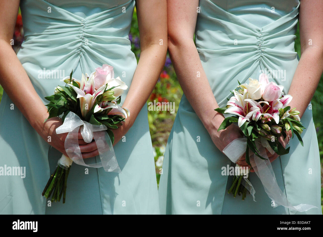 Bridesmaids holding bouquet Stock Photo Alamy