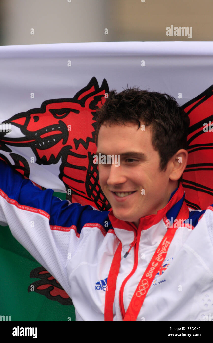 Welsh Olympic Athlete, Geraint Thomas, who won a cycling gold medal in the 2008 Beijing Olympics, celebrates in Cardiff Stock Photo