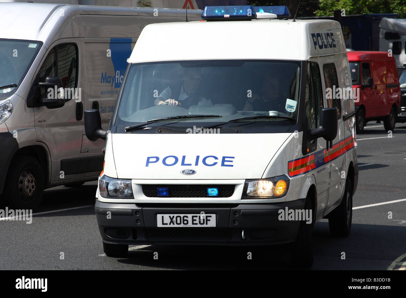 A Metropolitan Police van responding to an emergency, Parliament Square, Westminster, London, England, U.K. Stock Photo