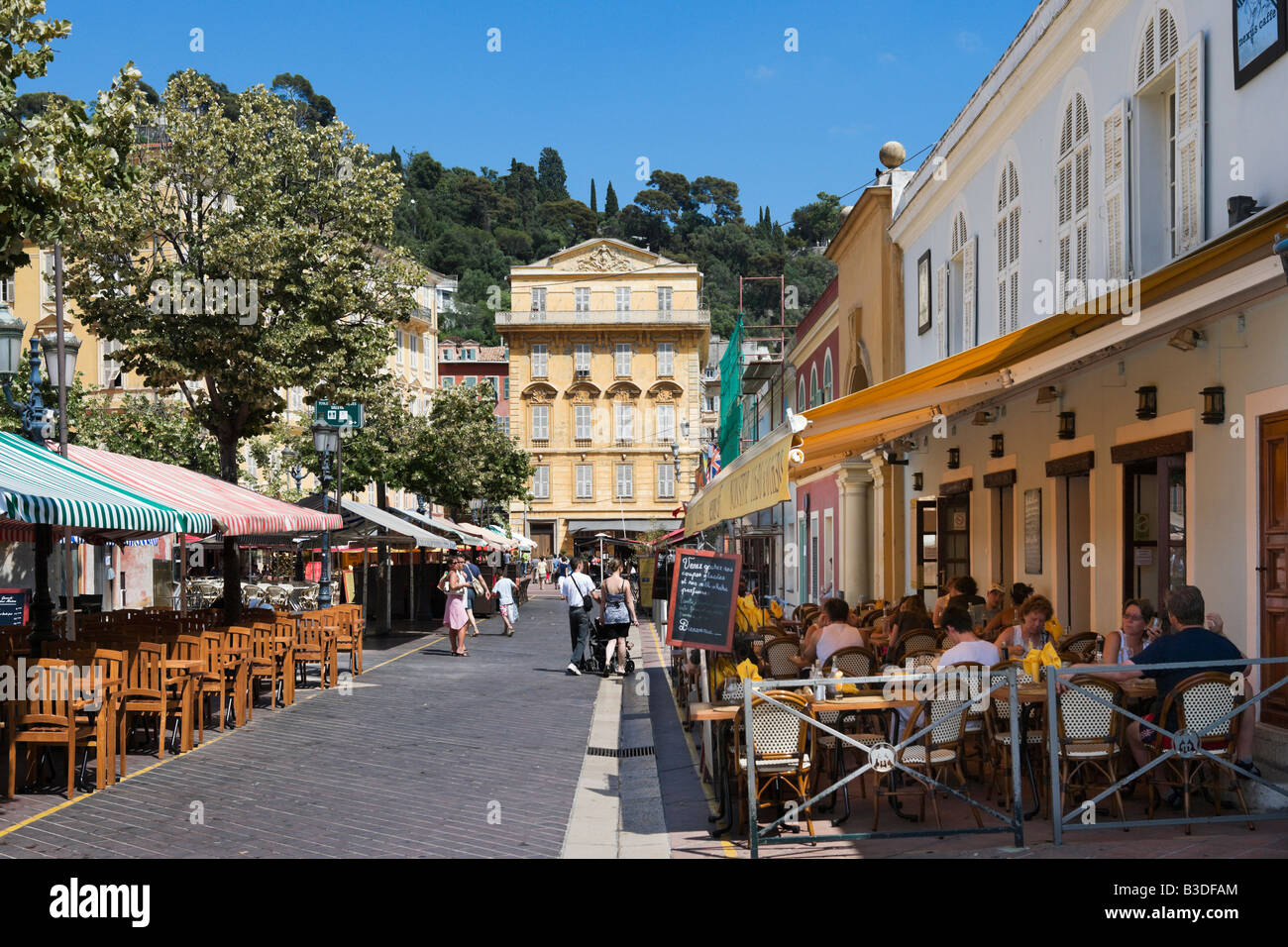 Restaurants by the Marche aux Fleurs in Cours Saleya in the old town (Vieux Nice), Nice, Cote d'Azur, French Riviera, France Stock Photo