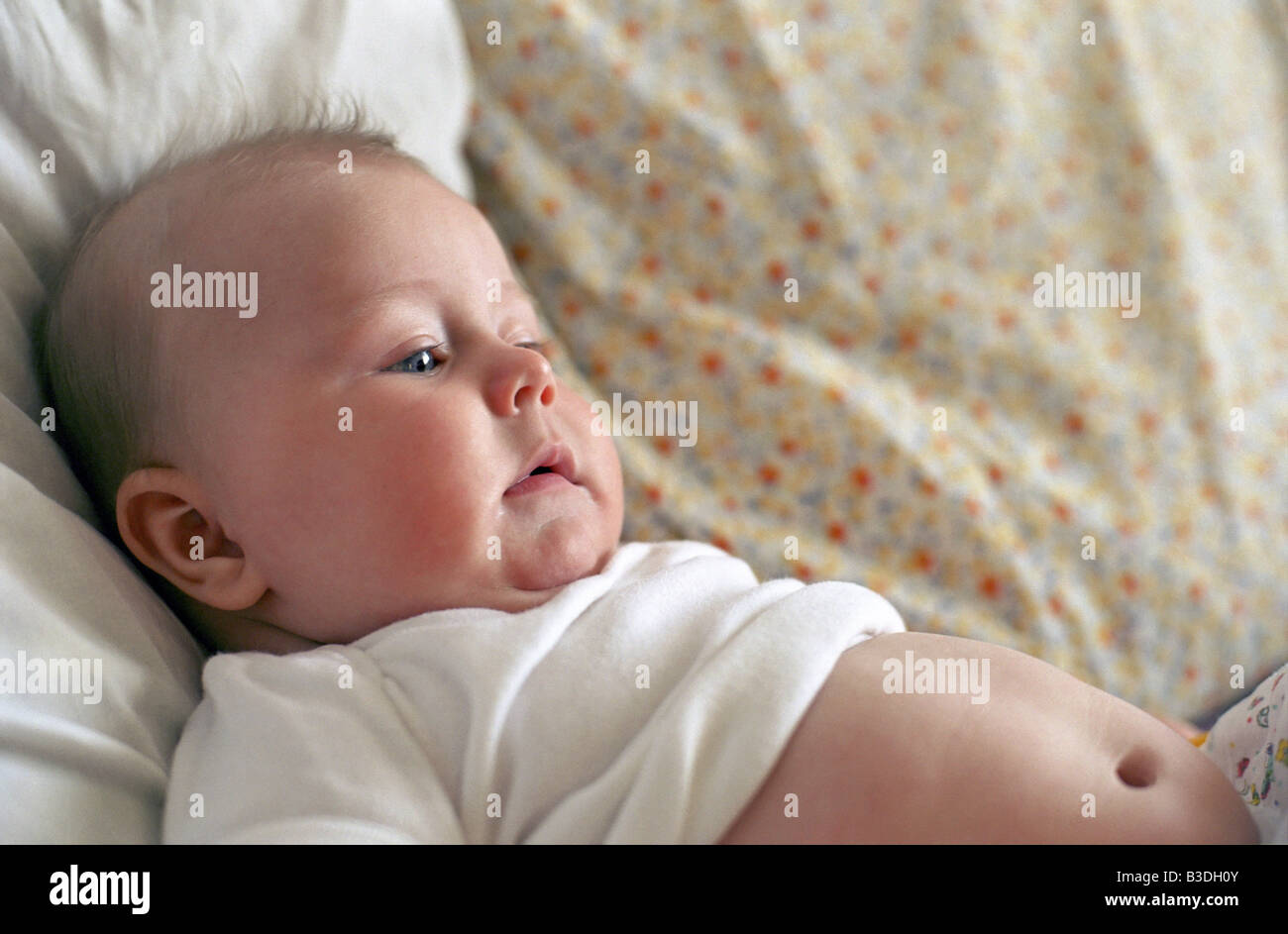 Baby eat child stomach relax calmface cute boy hires stock photography