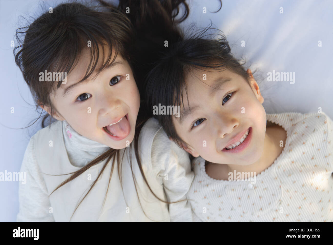 Smiling girls looking at camera Stock Photo