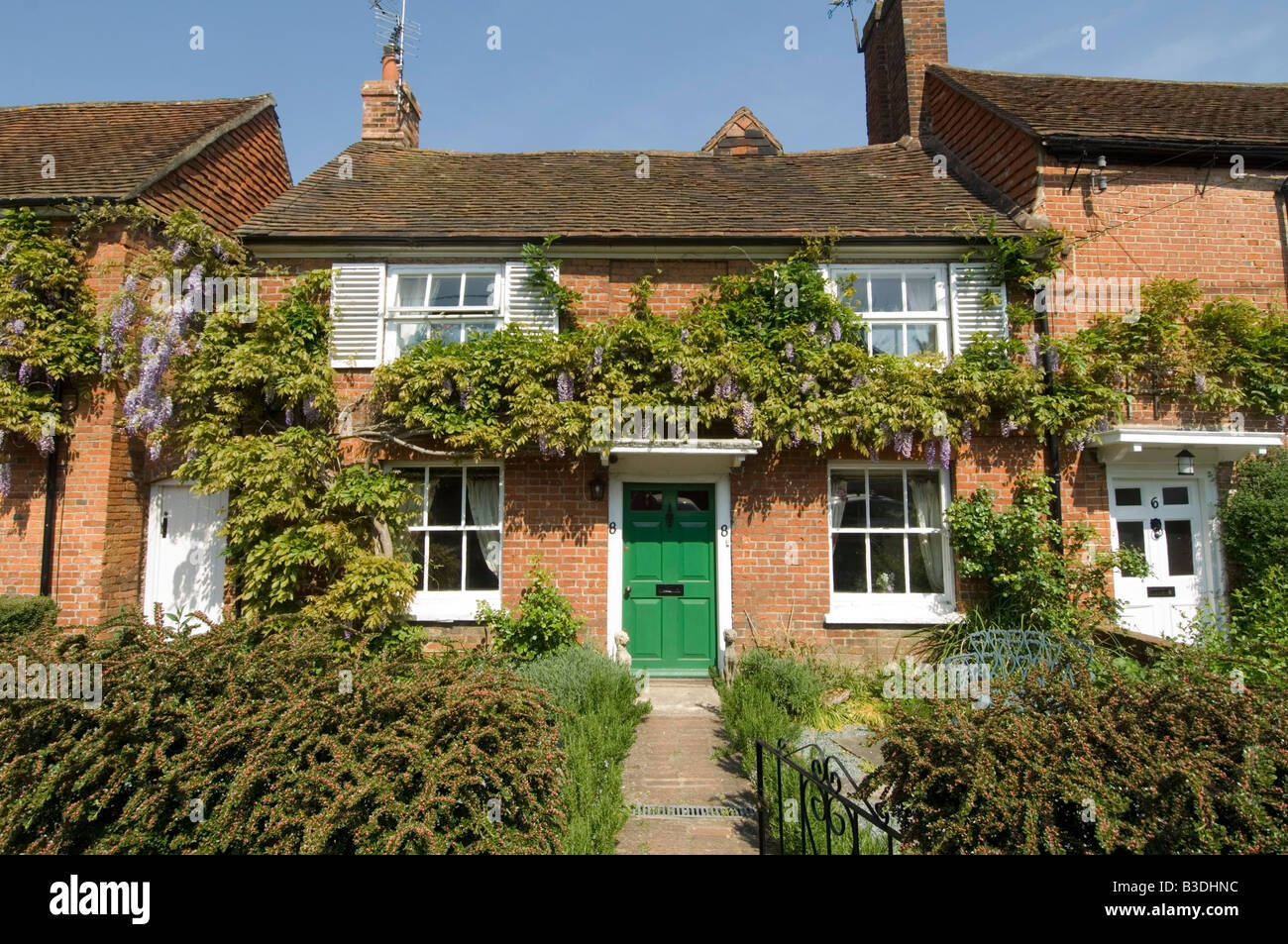 Old Cottage with Wisteria Crondall Surrey UK Stock Photo