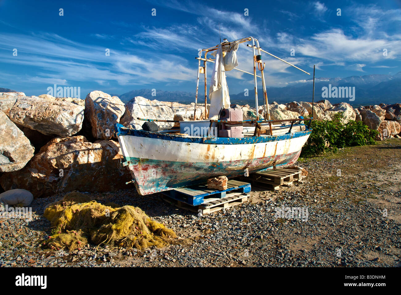 Old fisher boat at the popular beach of Marathi western Crete Stock