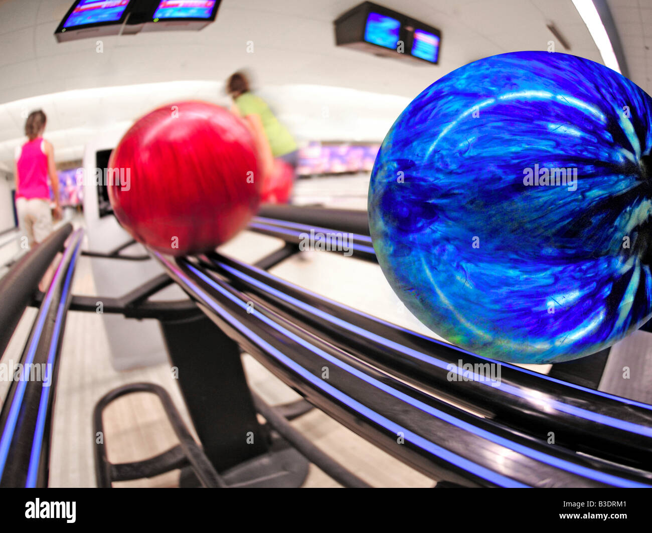 Bowling ball return in alley Stock Photo Alamy