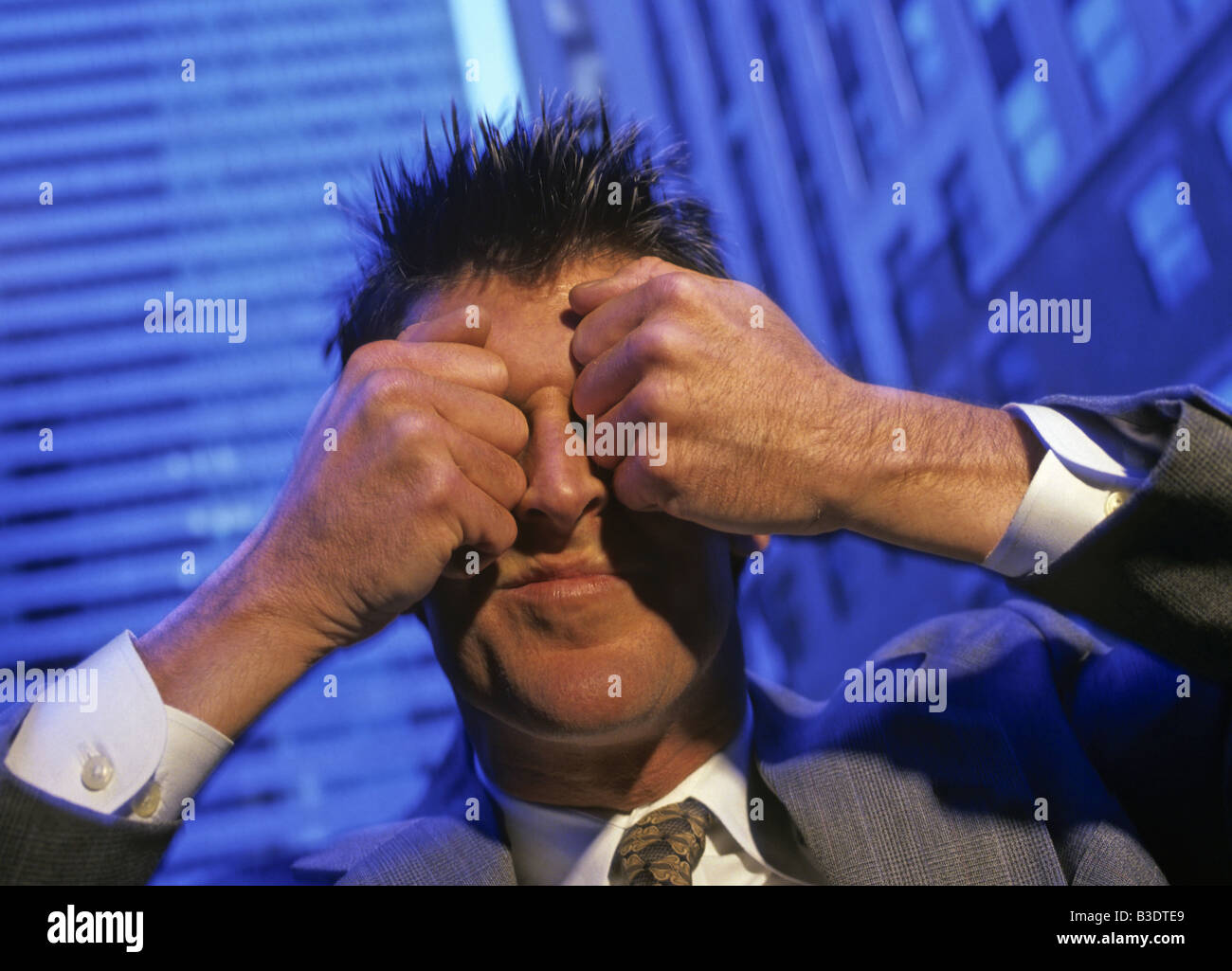 Businessman with eyes closed Stock Photo