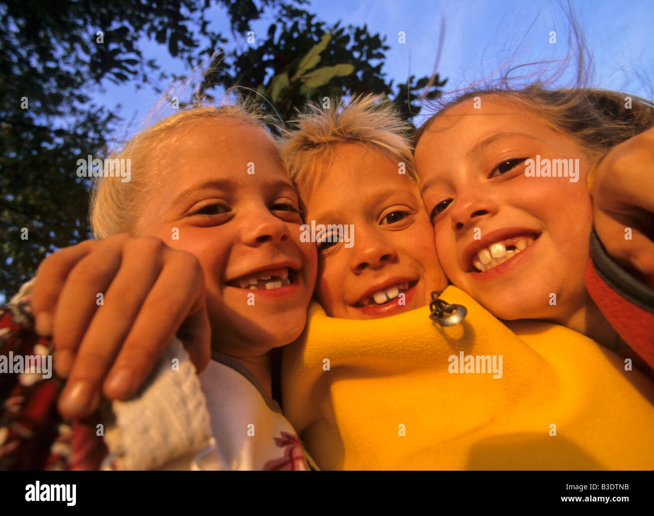 Two girls and one boy Stock Photo Alamy Two girls and one boy Stock Photo Alamy